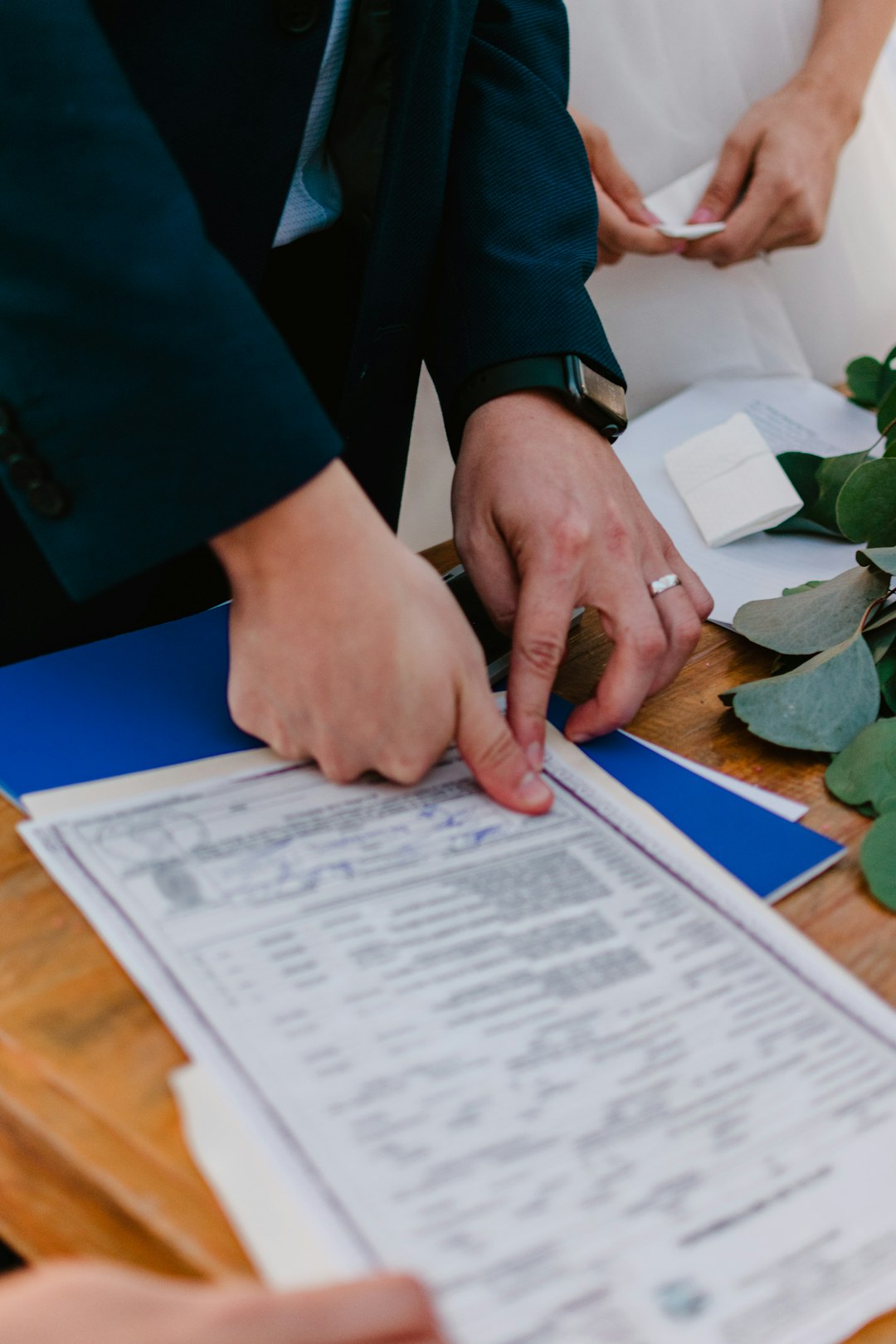 Mastering the First Impression: Your intriguing post title goes here couple-signing-marriage-certificate-with-officiant-present-dffsfhpdric